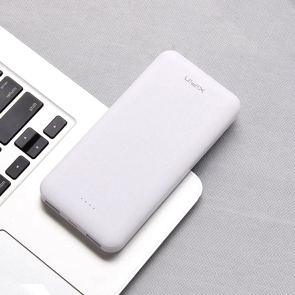 Xipin PX102 Hızlı Şarj Özellikli LED Göstergeli Dual USB Taşınabilir Akıllı Powerbank 10000mAh Beyaz
